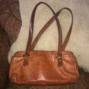 Fossil etched leather handbag